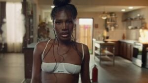 Doechii Drops ‘Anxiety’ Music Video With Elephants, Gotye Lookalike